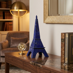Badakhshan Lapis Lazuli Eiffel Tower in a refined interior styled with Paris Architecture books and gold clock