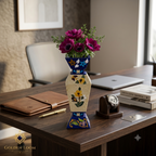 Golden Loom Afghanistan lapis lazuli mosaic vase displayed on a wooden desk with flowers, leather notebook and watch — luxury Afghan handmade home décor