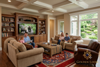 Chobi Kashan Afghan carpet styled in a warm family living room with wooden furniture and natural light — Golden Loom Afghanistan