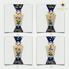 Four unique handmade Afghan stone mosaic vases showing different natural floral inlay patterns — each piece one-of-a-kind, crafted with lapis lazuli and semi-precious stone chips