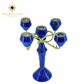 Top view of lapis lazuli 5-light candelabrum with gold rope arms on white background, Golden Loom Afghanistan