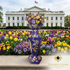 Golden Loom Afghanistan lapis lazuli mosaic vase with spring flowers displayed in front of the White House garden — handmade Afghan gemstone decorative vase, statement luxury gift