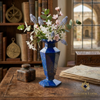 Detail of faceted lapis lazuli vase surface showing deep blue stone, golden pyrite flecks, and white calcite veining — Six-Sided Lapis Vase Set by Rayees