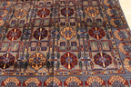 Overhead view of a high-quality Afghan  rug featuring a symmetrical blue, red, and cream geometric pattern and ornate central motifs