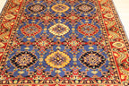 Afghan handmade Mamluk wool rug with repeating geometric medallions on royal blue field and crimson paisley border — hand-knotted in Afghanistan by Golden Loom