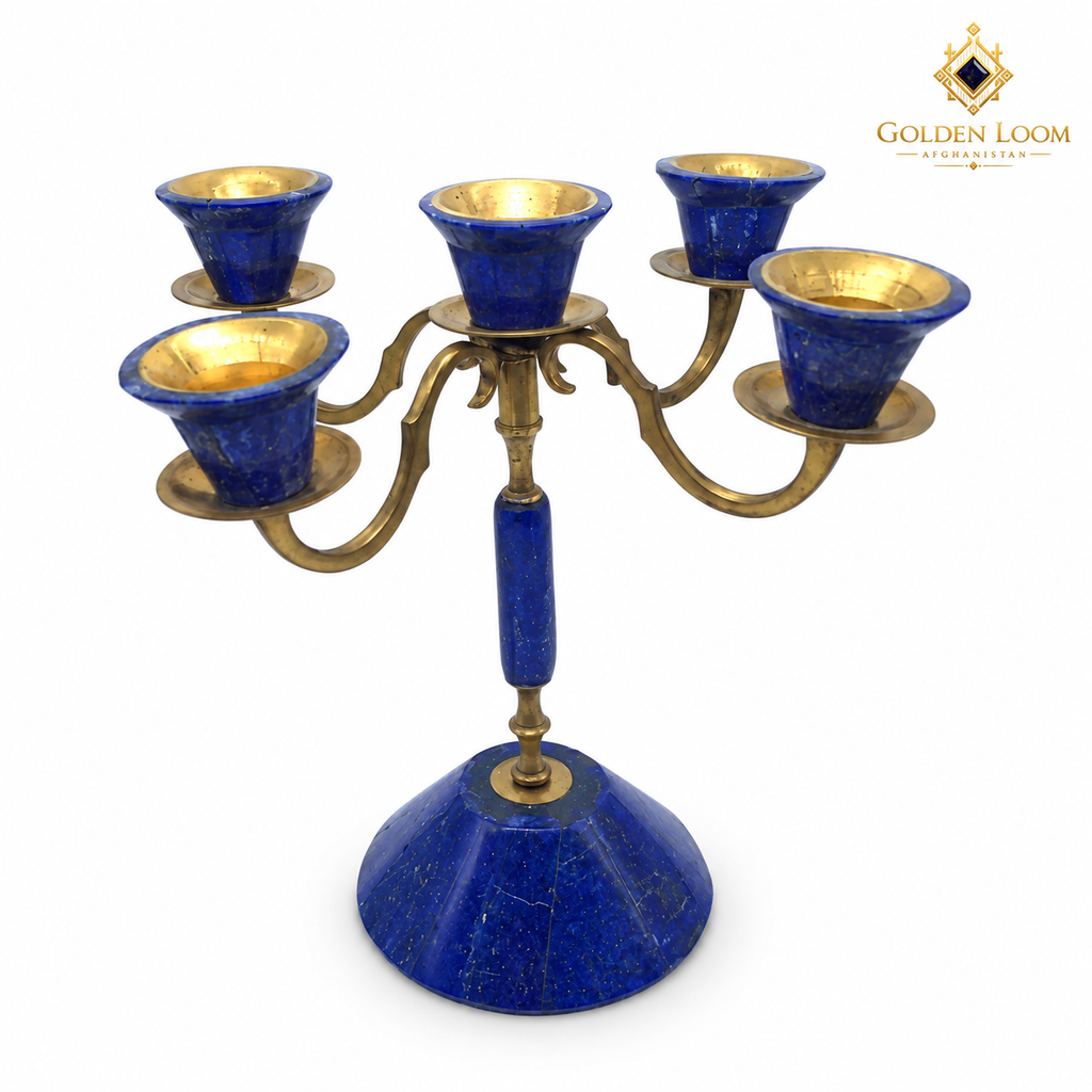 Top view of a handcrafted Afghan lapis lazuli and brass 5-arm candelabra showing gold-lined candle cups and lapis stone inlay — Golden Loom Afghanistan