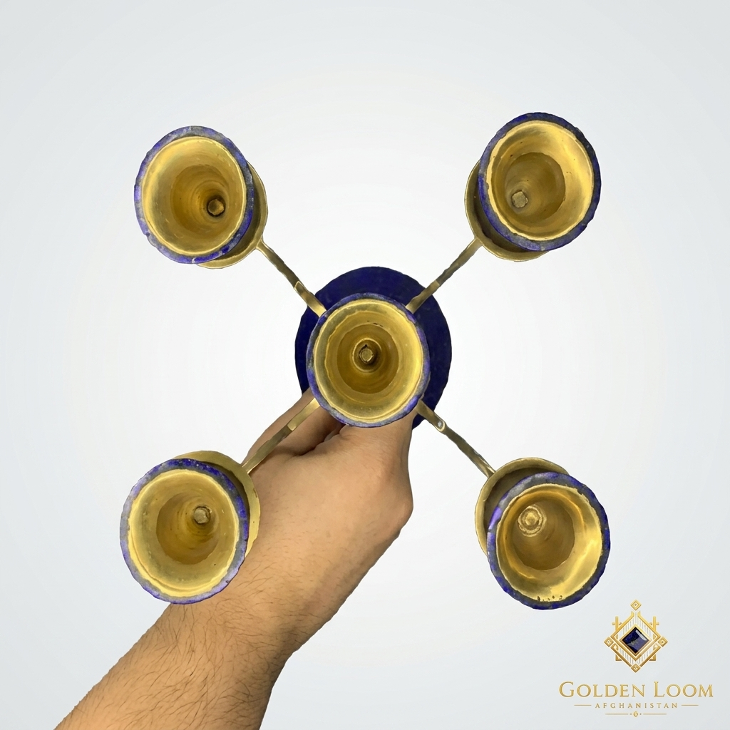 Top view of a handcrafted Afghan lapis lazuli and brass 5-arm candelabra showing gold-lined candle cups and lapis stone inlay — Golden Loom Afghanistan