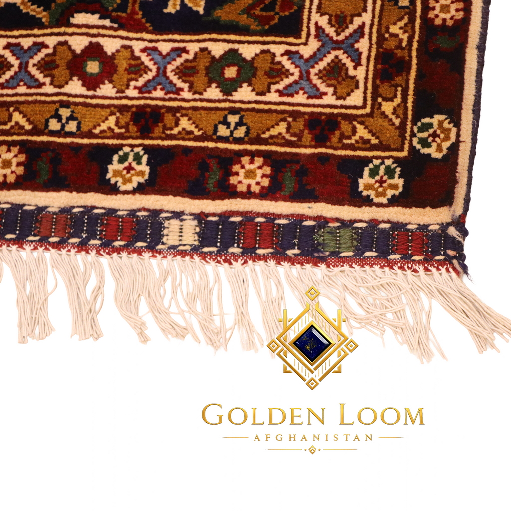 Natural ivory cotton fringe and hand-woven selvedge edge of an authentic Afghan hand-knotted wool carpet, Golden Loom Afghanistan
