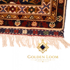 Natural ivory cotton fringe and hand-woven selvedge edge of an authentic Afghan hand-knotted wool carpet, Golden Loom Afghanistan