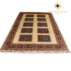 Hand-knotted Afghan wool rug with ivory field, ten decorative panel medallions, and deep burgundy border with geometric fringe — Golden Loom Afghanistan