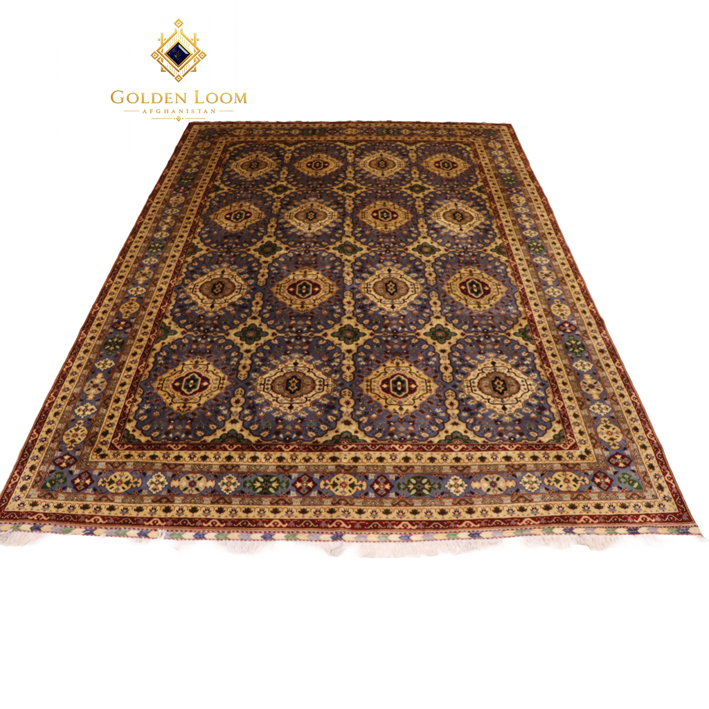 Hand-knotted Afghan area rug with all-over geometric medallion pattern in slate blue and gold, featuring a multi-border frame with crimson guard stripes and ivory fringe