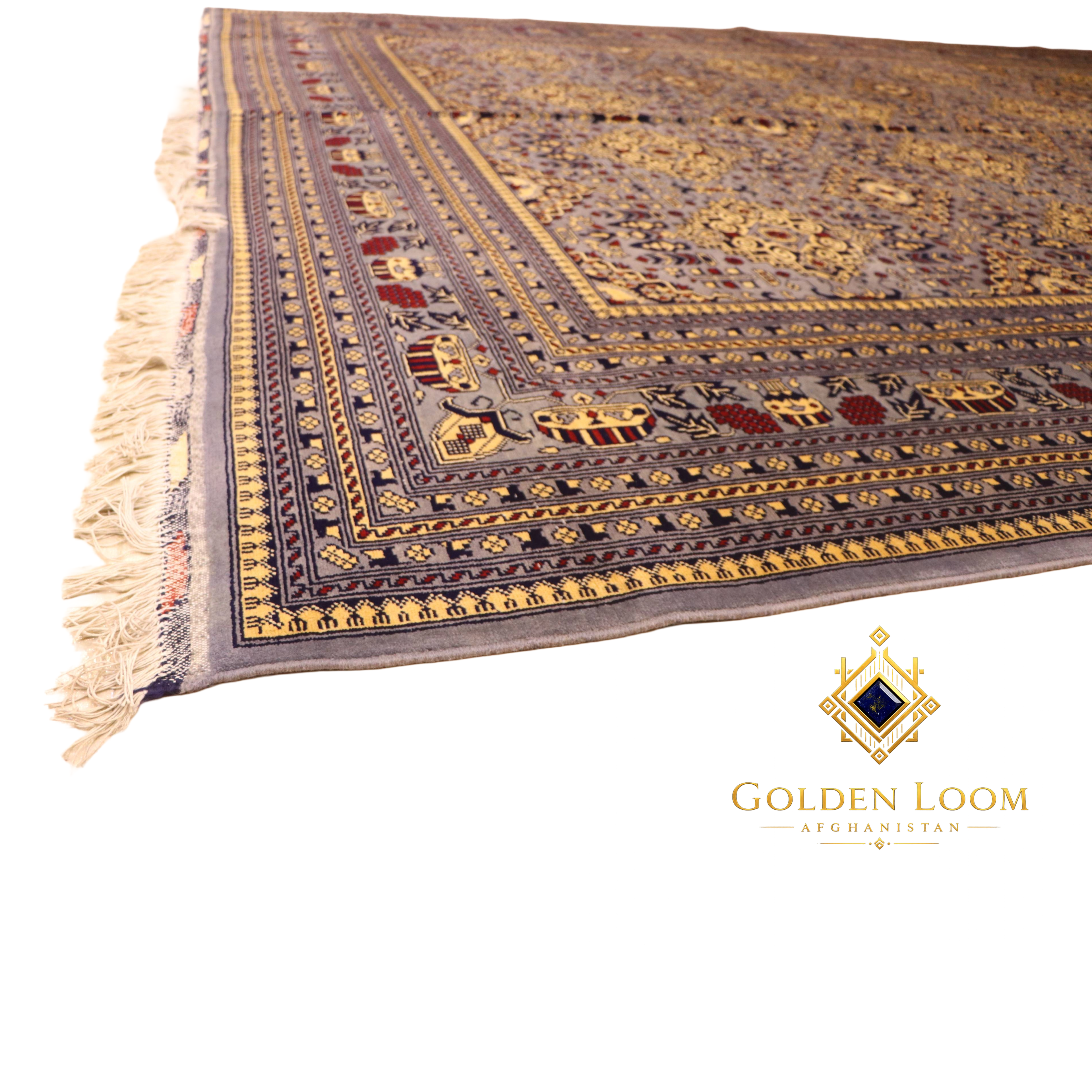 Low-angle perspective of hand-knotted Afghan carpet corner showing layered geometric border in gold, navy, and grey with ivory fringe detail