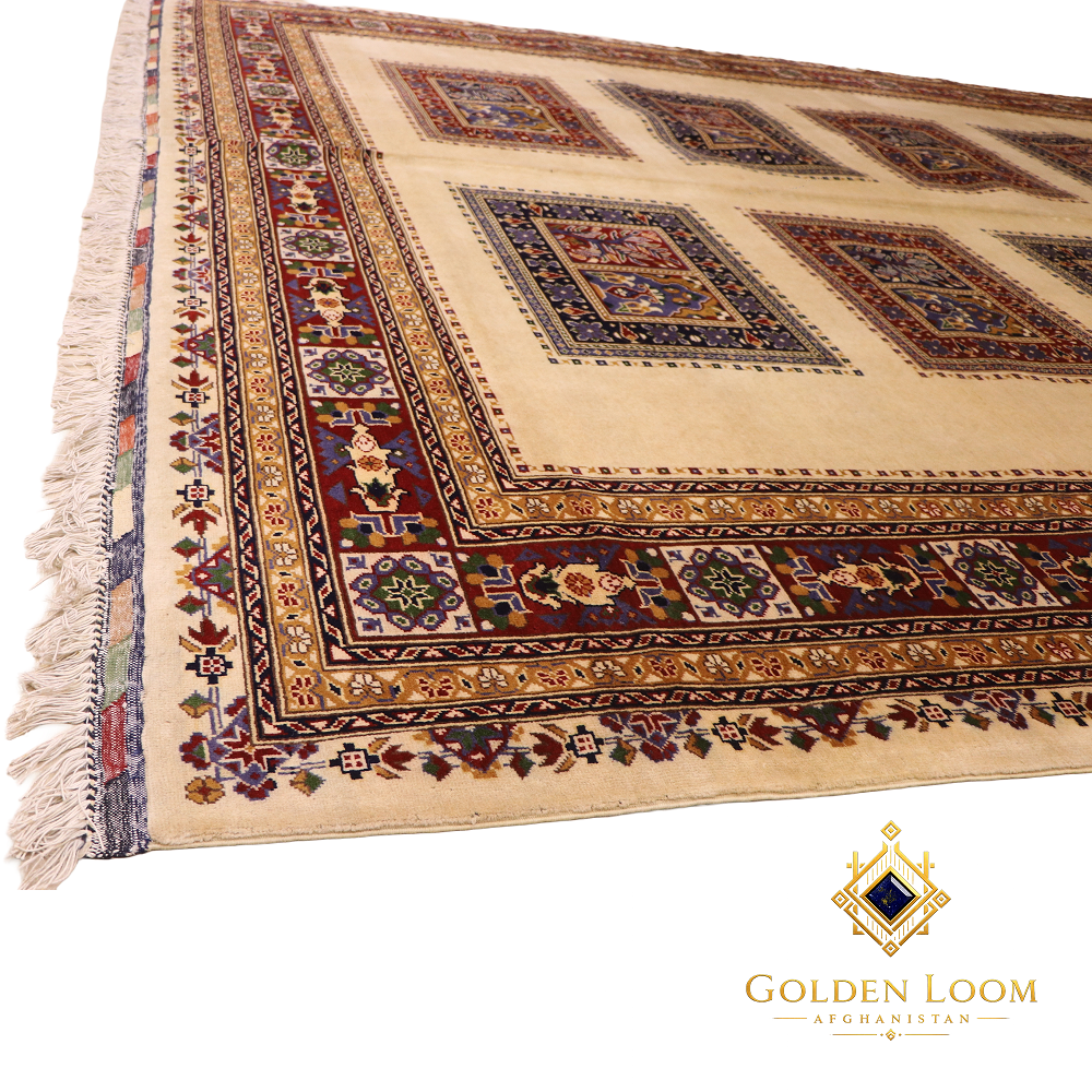Side-angle view of Afghan hand-knotted rug highlighting intricate multi-band border with floral and geometric motifs in deep red, cobalt blue, and gold