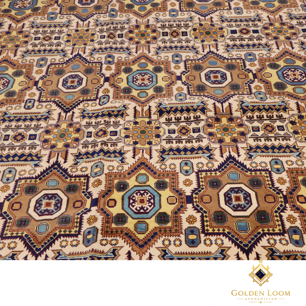 Close-up of Afghan Mamluk hand-knotted rug pile showing repeating octagonal medallion pattern in ivory, teal, gold and navy on wool foundation