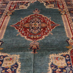 The Mazar-e-Sharif Kashan Legacy highlighting its hand-knotted pattern, natural wool and artisan craftsmanship.