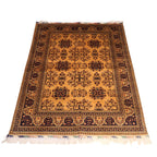 The Jawzjan Golden Bokhara Legacy highlighting its hand-knotted pattern, natural wool and artisan craftsmanship.