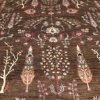 The Jawzjan Chobi Chinar Legacy highlighting its hand-knotted pattern, natural wool and artisan craftsmanship.