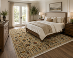 Hand-knotted Afghan floral rug in ivory and earth tones styled in a bright farmhouse bedroom, Golden Loom Afghanistan