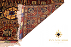 Close-up of the back and fold of a handwoven Afghan wool carpet showing knot density and weave structure, Golden Loom Afghanistan