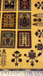 Real photo of hand-knotted Afghan Chobi rug showing golden field and multicolor mirror panels – crafted in Mazar-i-Sharif, Afghanistan
